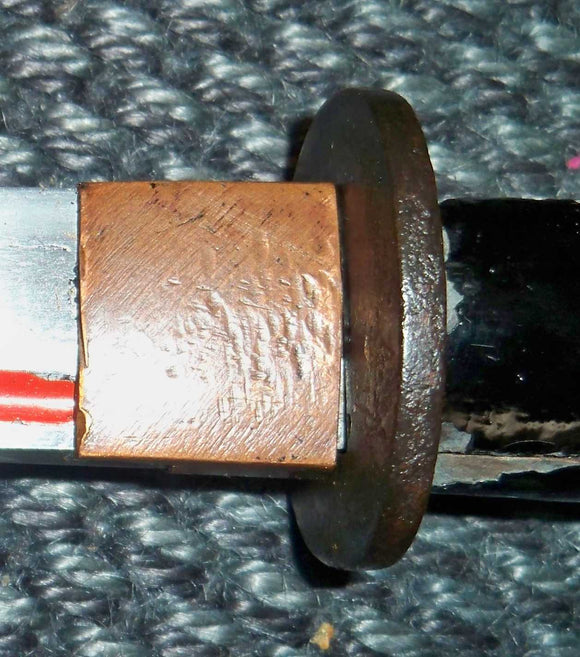 Why Did Japanese Swords Have a Piece of Metal Around the Base of the Blade?